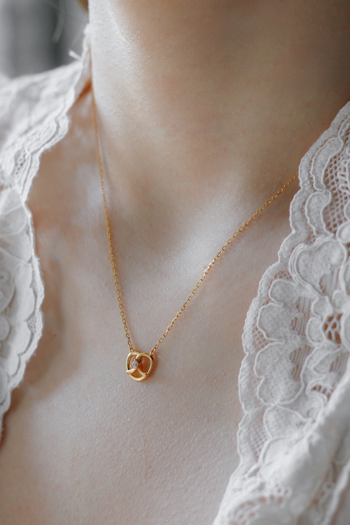 Dainty Gold Love-Knot Crystal Necklace