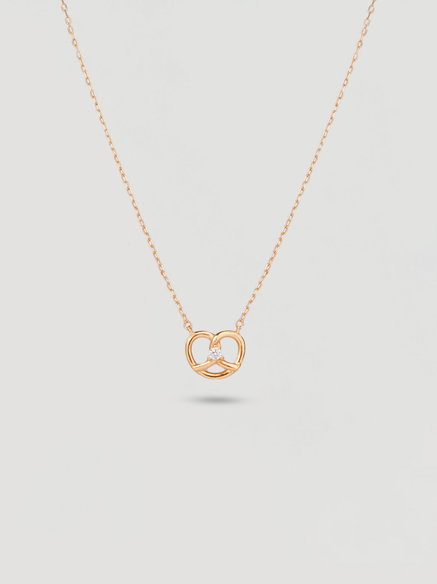 Dainty Gold Love-Knot Crystal Necklace
